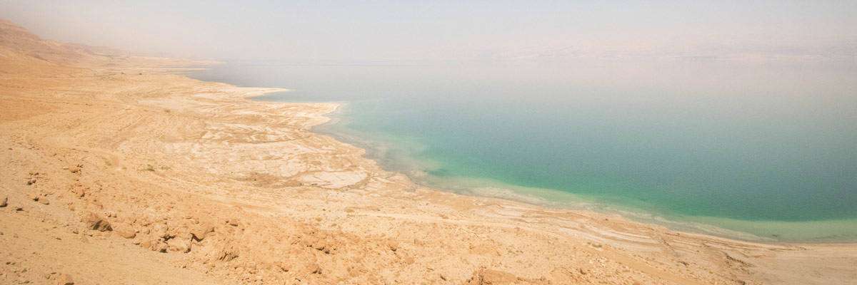 The dead sea is located in Israel and Jordan. Float on the alty water and enjoy the healing benefits of the dead sea mud!